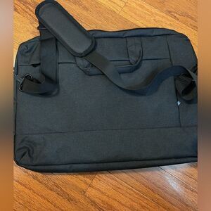 Black briefcase/padded 17.5" laptop sleeve. Use w/handle or 50" shoulder strap